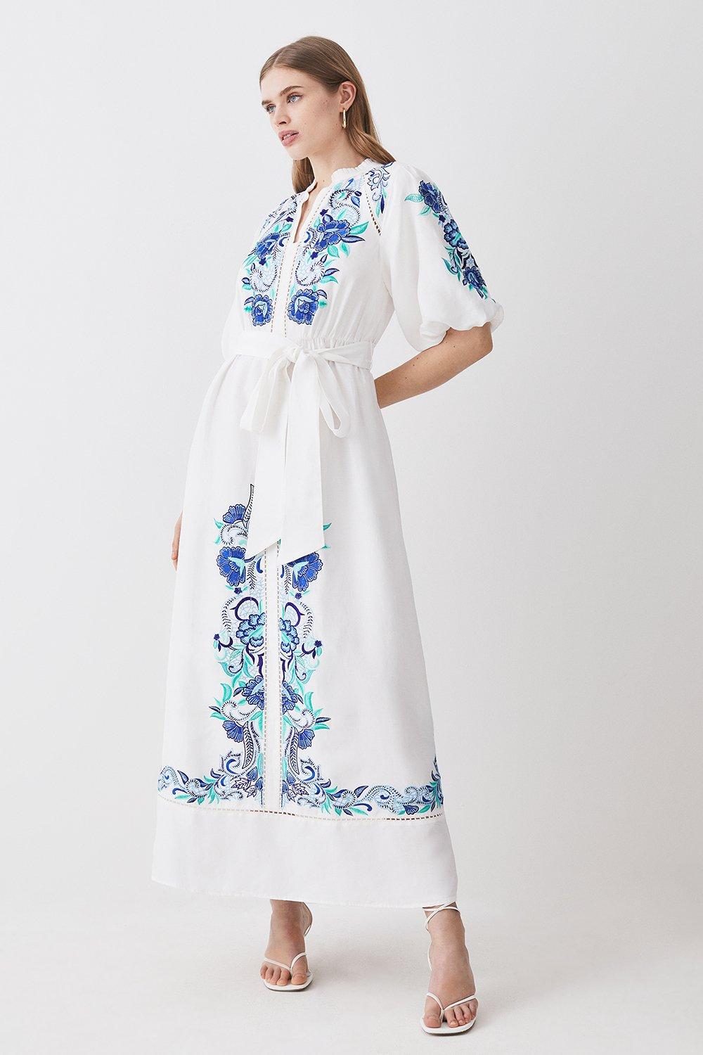 Blue dress store with white embroidery